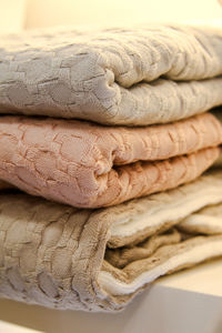 Close-up of towels on shelf