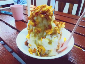 Close-up of breakfast served on table