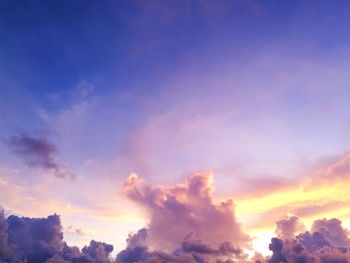 Low angle view of dramatic sky during sunset