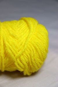 Close-up of yellow leaf on table