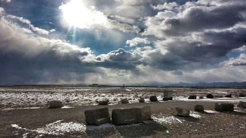 Scenic view of sea against cloudy sky