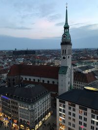 High angle view of buildings in city against sky