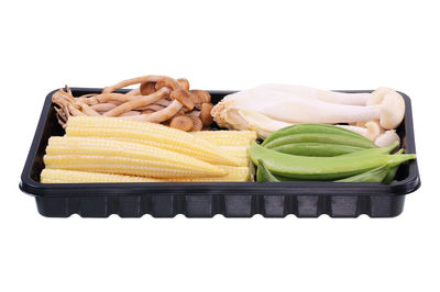 High angle view of bread against white background