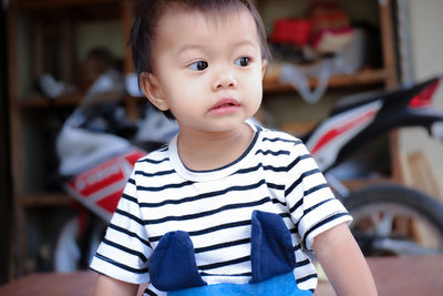 Portrait of cute boy at home