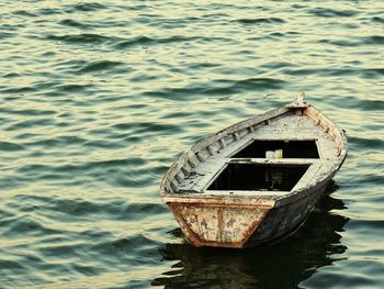 Boat floating on lake