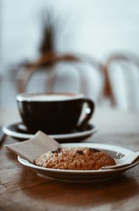 Close-up of coffee cup on table