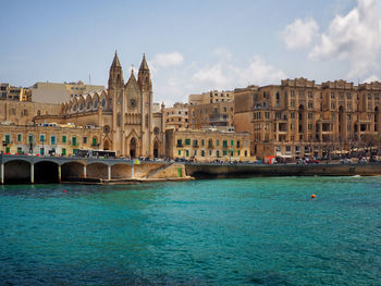 View of buildings at waterfront