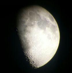 Low angle view of moon against clear sky