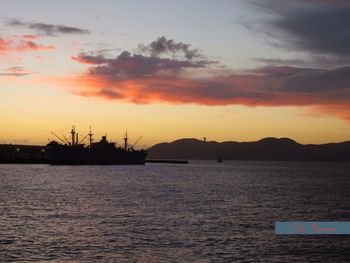 Scenic view of sea at sunset