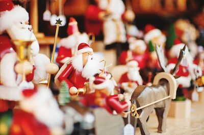 Close-up of christmas ornaments at market stall