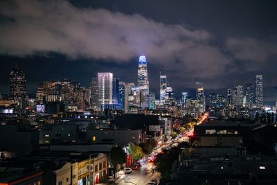 Illuminated buildings in city at night
