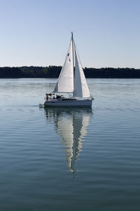 Sailing boat at lake chiemsee, bavaria, germany