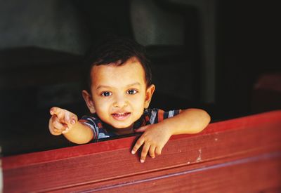 Portrait of cute baby girl at home
