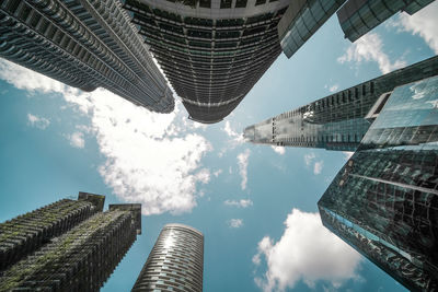 Low angle view of modern buildings against sky