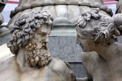 Close-up of statues at pallas athene fountain