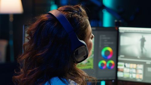 Side view of young woman looking away