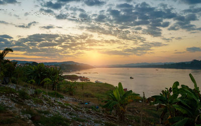 Scenic view of sea against sky during sunset