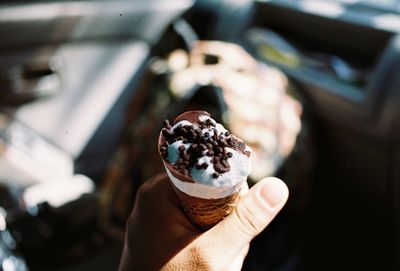 Cropped hand of person holding ice cream