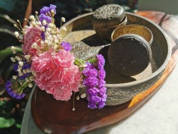 High angle view of pink roses on table