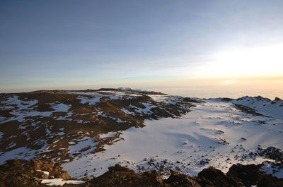 Scenic view of sea against sky during winter