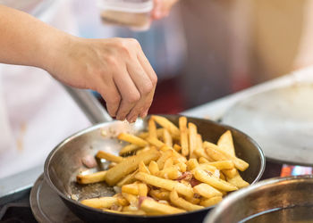 Close-up of person preparing food