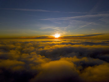 Low angle view of dramatic sky during sunset