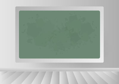 Close-up of text on white wall