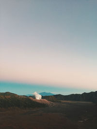 Scenic view of landscape against sky during sunset