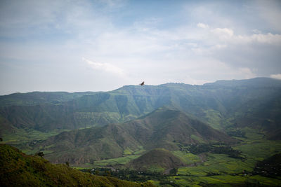 Scenic view of mountain range against sky