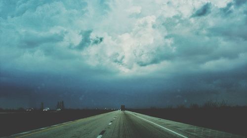 View of road against cloudy sky