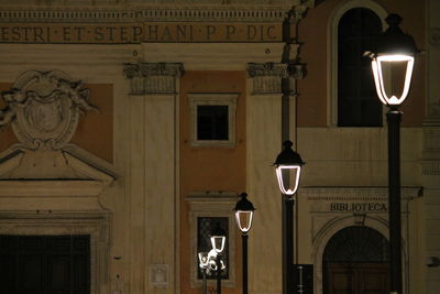 Low angle view of illuminated lamp