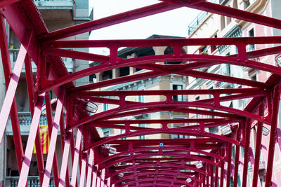 Low angle view of red structure against sky