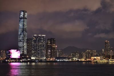 Illuminated buildings in city at night