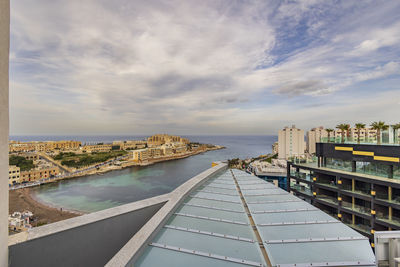 Bridge over sea against sky