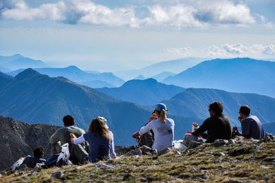 Group of hikers resting in the mountains