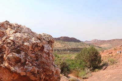 Scenic view of rock formations at arches national park against sky