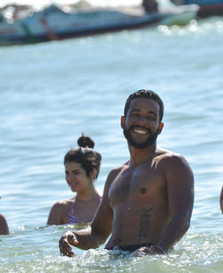 Young latinos during summer vacation at búzios - rio de janeiro - beach