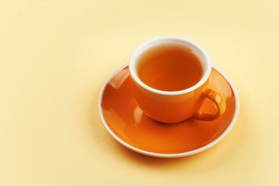 Close-up of coffee served on table