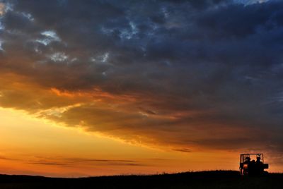 Scenic view of dramatic sky during sunset