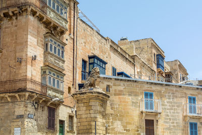 Low angle view of buildings against sky