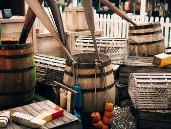 Wooden oars in barrel