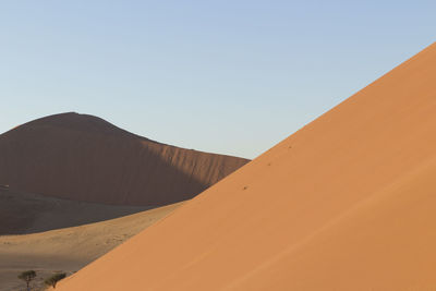 View of desert against clear sky