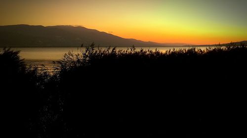 Scenic view of mountains at sunset