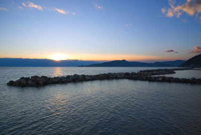 Scenic view of sea against sky during sunset