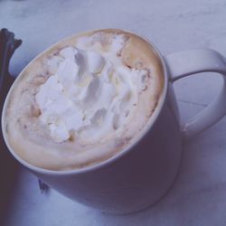 High angle view of cappuccino on table