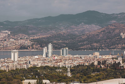 High angle view of city buildings against sky