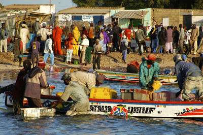 People on boat in temple