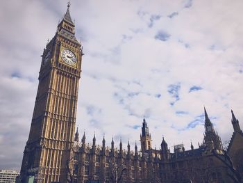 Low angle view of big ben against sky