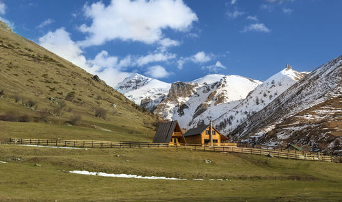 Scenic view of snowcapped mountains against sky