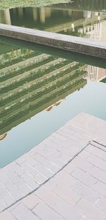 High angle view of swimming pool by lake